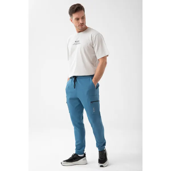 Niebieskie spodnie dresowe męskie TW BASIC PANTS 192 M BLUE - XXXL