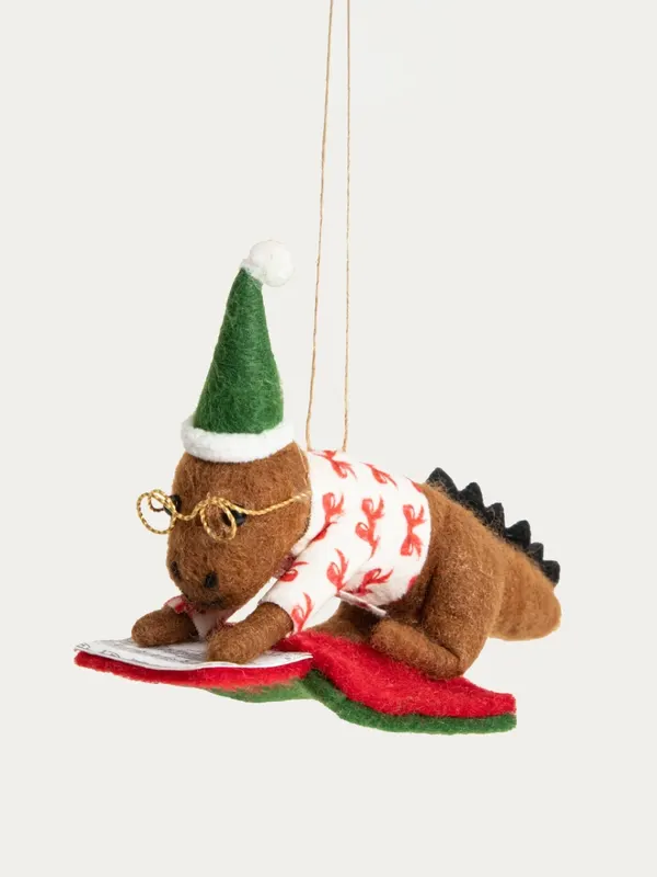 Zawieszka PETTIES filcowa leżący dinozaur ze śpiewnikiem 14,5x7x9 cm