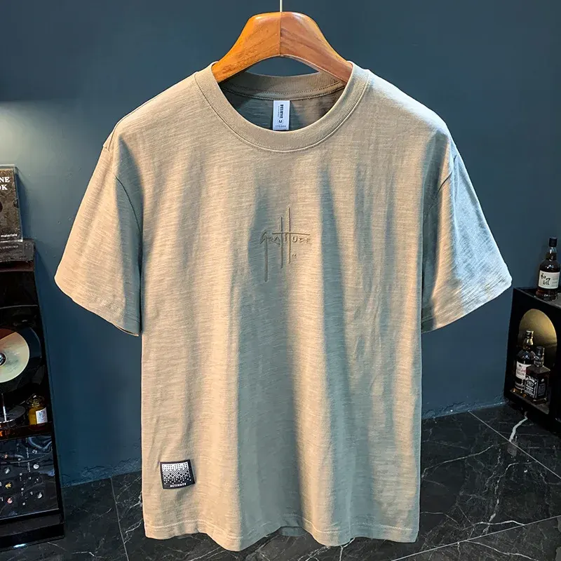 T-shirt men's 2025 summer new fashion simple round neck breathable loose short sleeved comfortable men's top