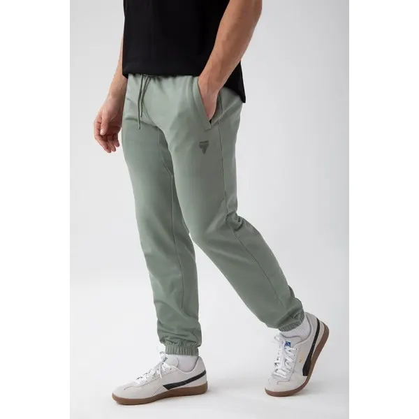 Zielone spodnie dresowe męskie TW BASIC PANTS 180 M GREEN - S