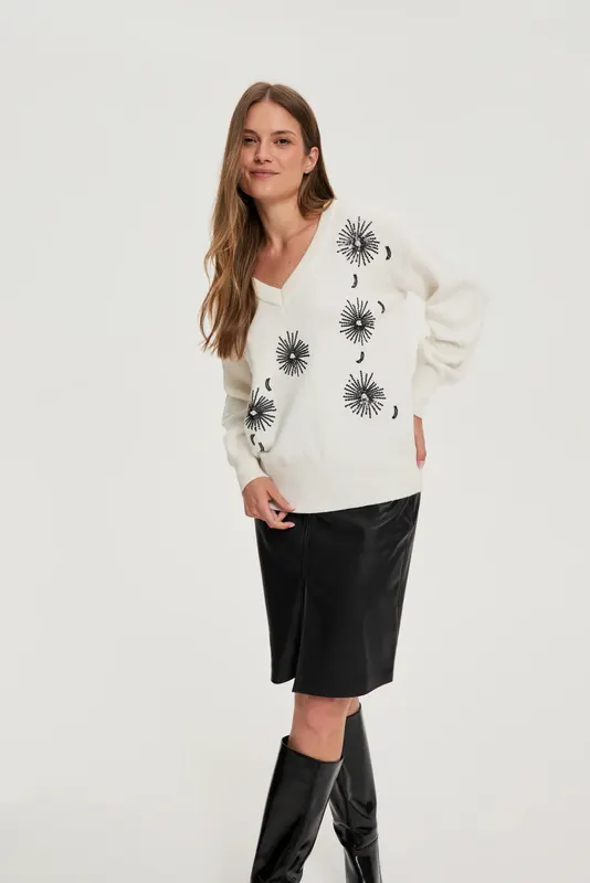 Sweter z cekinami biały