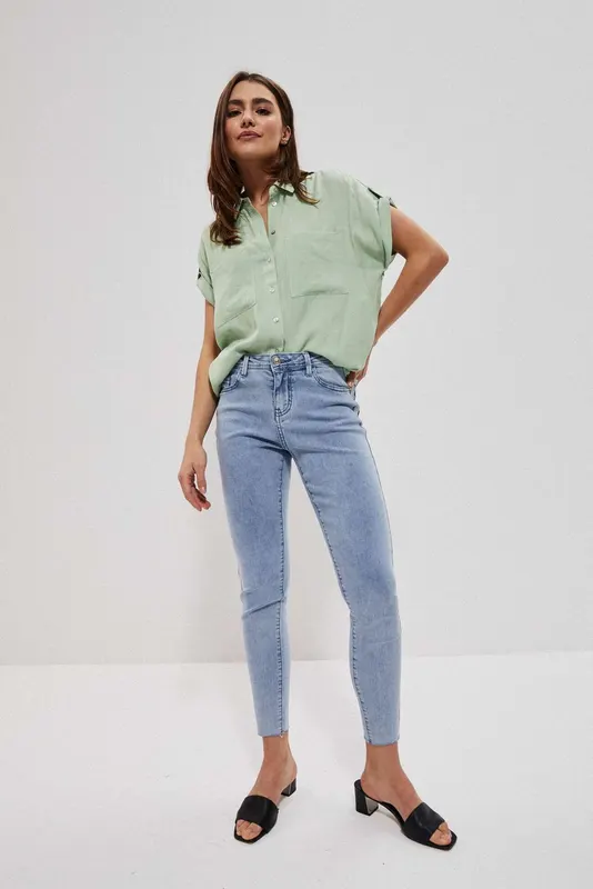 Jeansy medium waist z kieszeniami błękitne